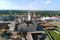 Aerial view of wood processing factory with stacks of lumber at plant manufacturing yard