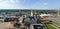 Aerial view of wood processing factory with stacks of lumber at plant manufacturing yard