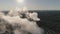 Aerial view on the working Power station. Cooling tower of nuclear power plant. coal-burning power plant