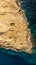 Aerial view of Xwejni Salt Pans,Xlendi Cliffs on Gozo island,Malta.Amazing natural creations from limestone.Traditional Sea-Salt