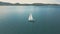 Aerial view of yacht sailing near beautiful Islands. Beautiful clouds in the background