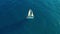 Aerial view. Yacht sailing on opened sea. Sailing boat. Yacht from above. Yachting at windy day. The Yacht. Sailboat.