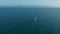 Aerial view. Yacht sailing on opened sea. Sailing boat. Yachting video footage. Yacht from above. Sailboat view from