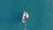 Aerial view. Yacht sailing on opened sea. Sailing boat. Yachting video footage. Yacht from above. Sailboat view from