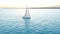 Aerial view. Yacht sailing on opened sea. Sailing boat. Yachting video footage. Yacht from above. Sailboat view from