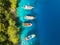 Aerial view of yachts and boats on the sea at sunset in summer