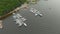 Aerial view on a yaght and boats parking in a calm bay