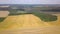 Aerial view of yellow agriculture wheat field ready to be harvested in late summer.