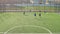 Aerial view of young soccer forward scoring goal