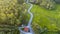 Aerial view of  zigzag road through rice fields