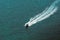 Aerial view of a zodiac motorboat sailing in the turquoise sea