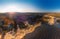 Aerial viewpoint of Love Valley Peri Bacalari Sunset over Red valley in Cappadocia canyon, mountains and balloons.. Nevsehir