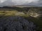 Aerial views of Limestone Pavement near Malham with Comb Hill and Dean Moor Hill in the distance