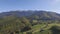 Aerial views of the scenic rural landscape surrounded by Carpathian Mountains, Brasov, Romania