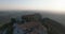 Aerial views of Stavrovouni monastery and eastern sunrise over majestic mountain