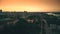 Aerial of Vistula river and Warsaw buildings in the evening