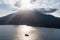 Aerial of Volcano, Light and Small Ship in Ring of Fire