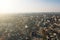 Aerial Voronezh city midtown panorama at sunset, roads with car traffic and buildings, center of old European city in spring