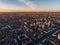 Aerial Voronezh city midtown panorama at sunset, roads with car traffic and buildings, center of old European city in spring