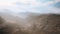 Aerial vulcanic desert landscape with rays of light