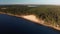 Aerial White Dune on the river Lielupe in Varnukrogs - Golden Hour sunset top view from above - Drone shot with