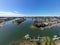 Aerial wide angle view of Hastings River and green Port Macquarie town in New South Wales, Australia