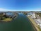 Aerial wide angle view of Hastings River and green Port Macquarie town in New South Wales, Australia