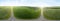 Aerial wide panoramic view of green fields under a blue sky with clouds in a summer day. Full VR 360 Degree Panorama Seamless