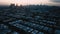 Aerial wide shot early morning scenery of the small town houses in Astoria, Queens and Midtown Manhattan cityscape on