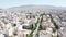 Aerial wide shot of the urban city of Athens, Greece