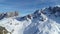 Aerial of winter landscape, winter sports like ski touring in the mountains, 4K
