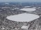 Aerial winter snow landscape view of rural and city land between Minneapolis Minnesota and Indianapolis Indiana with stark contras