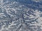 Aerial winter snow landscape view of rural and city land between Minneapolis Minnesota and Indianapolis Indiana with stark contras