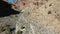 Aerial Woman hiking desert mountain Nine Mile Canyon Utah 4K