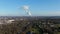 Aerial Zoom to Power Plant Over Highway, Industrial Town, in Fall Winter