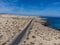 Aeriav view on sandy dunes, beach and Costa Calma, Fuerteventura, Canary islands, Spain in winter on sunset