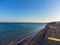 Aeriav view on sandy dunes, beach and Costa Calma, Fuerteventura, Canary islands, Spain in winter on sunset