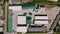 Aero, top view, large agricultural enterprise, agricultural company. large area with warehouses, elevators and