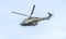 Aerobatic elicopter pilots training in the sky of the city. Puma elicopter, navy, army drill