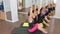 Aerobic Pilates personal trainer in a gym group class