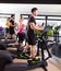 Aerobics elliptical walker trainer group at gym