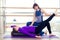 Aerobics Pilates personal trainer helping women