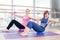 Aerobics Pilates personal trainer helping women