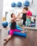 Aerobics woman personal trainer of children girl