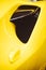 Aerodynamic yellow exotic supercar carbon part