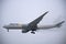 AeroLogic Boeing 777f Cutting Through The Fog Side View
