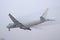 AeroLogic Boeing 777f Cutting Through The Fog In Toronto