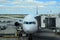 Aeroplane closeup at airport terminal for arrival