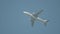 Aeroplane flying in clean blue sky background, bottom view. Action. Airbus flying in the sky, concept of transportation.