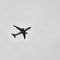 Aeroplane flying in the cloudy sky during the day time near Qutub Minar in Delhi India, Aeroplane flying high in the sky